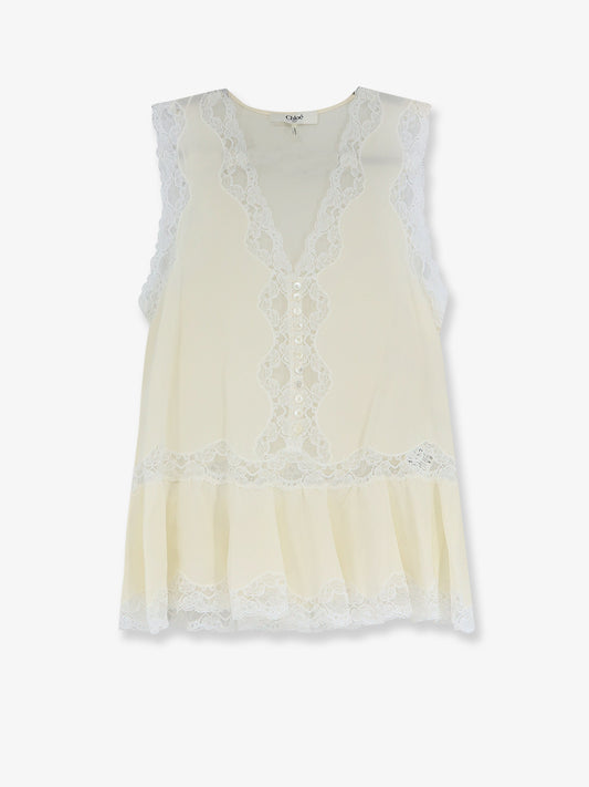 Top in seta con inserti in pizzo