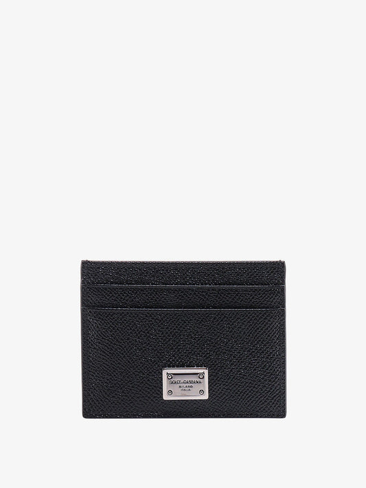 Leather card holder with metal logo tag