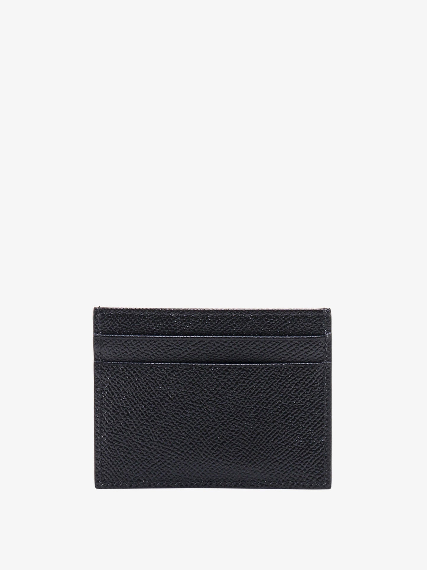 Leather card holder with metal logo tag