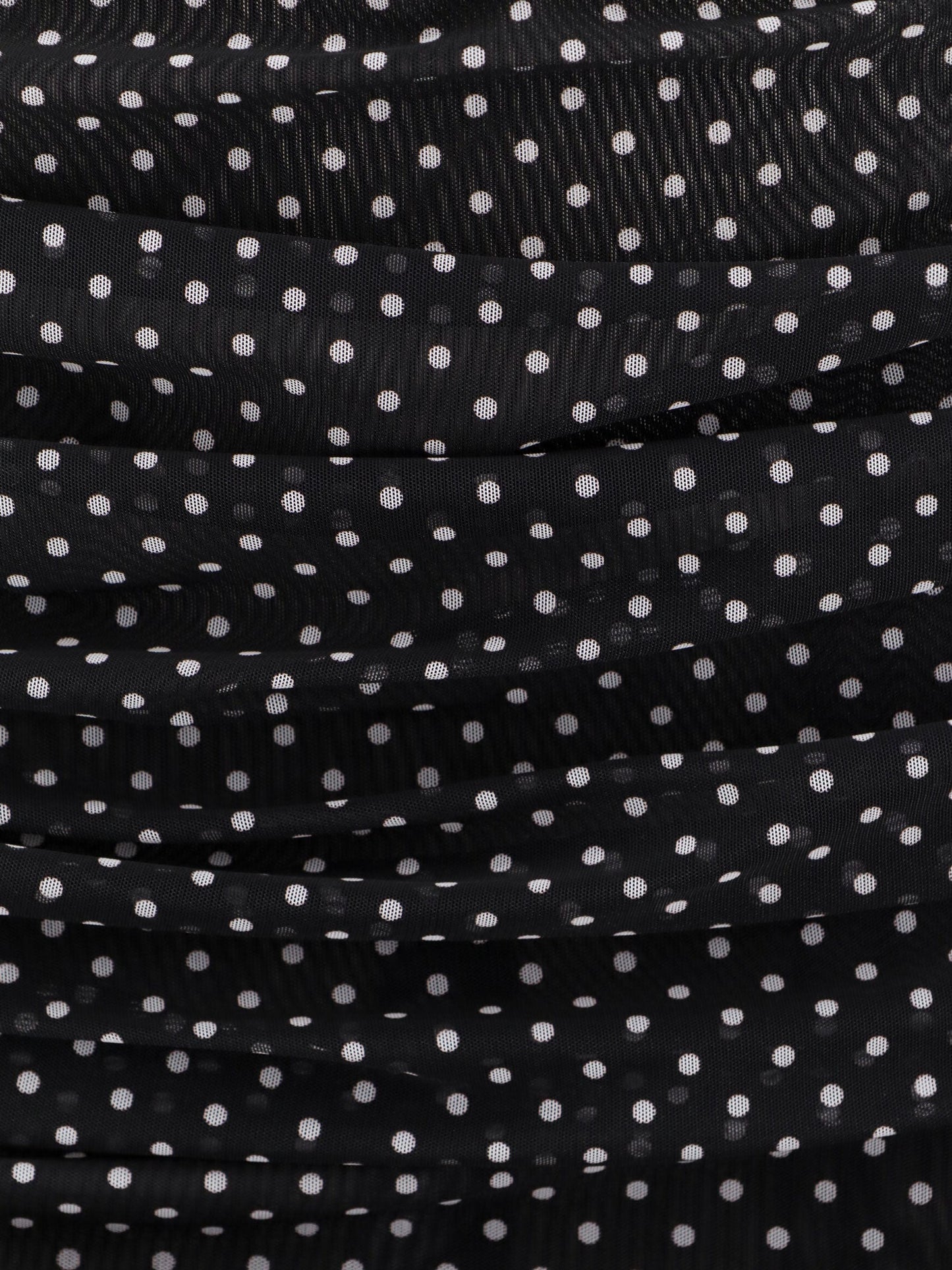 Polka-dots dress with drapery