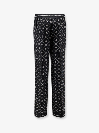Silk trousers with all-over logo print thumbnail