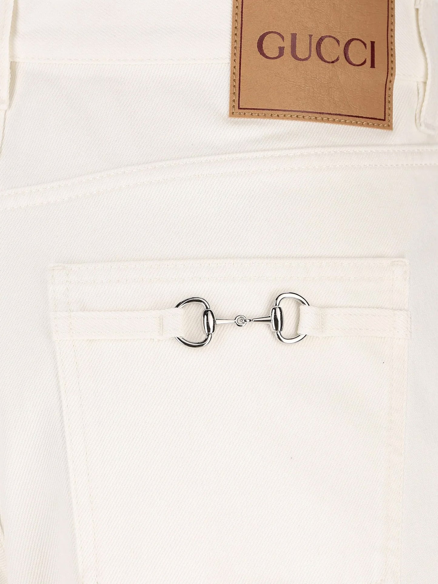 Denim trousers with metal Horsebit detail on the back