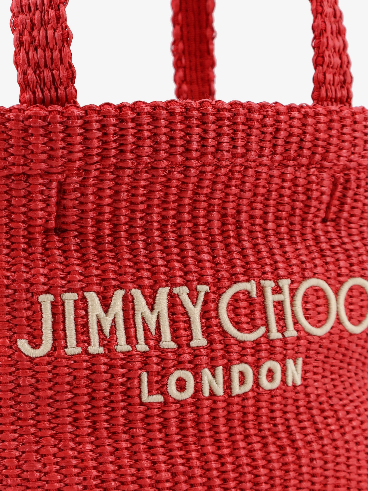 Raffia crossbody bag with embroidered logo on the front