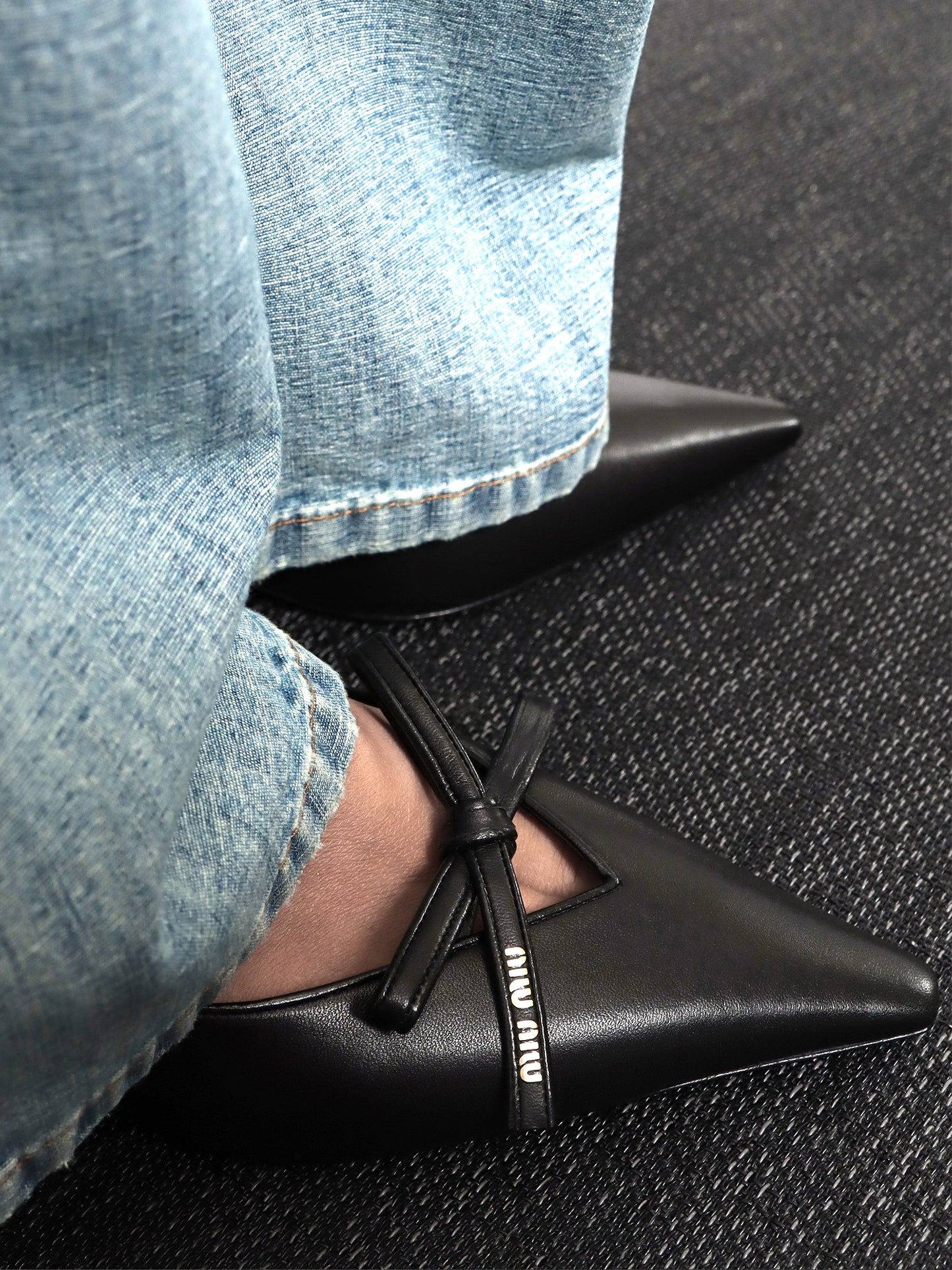 Leather décolleté with logo bow detail