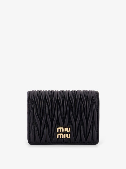 Quilted leather wallet with lettering logo on the front
