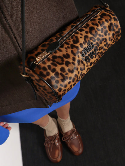 Pouch leather bag with animal print thumbnail