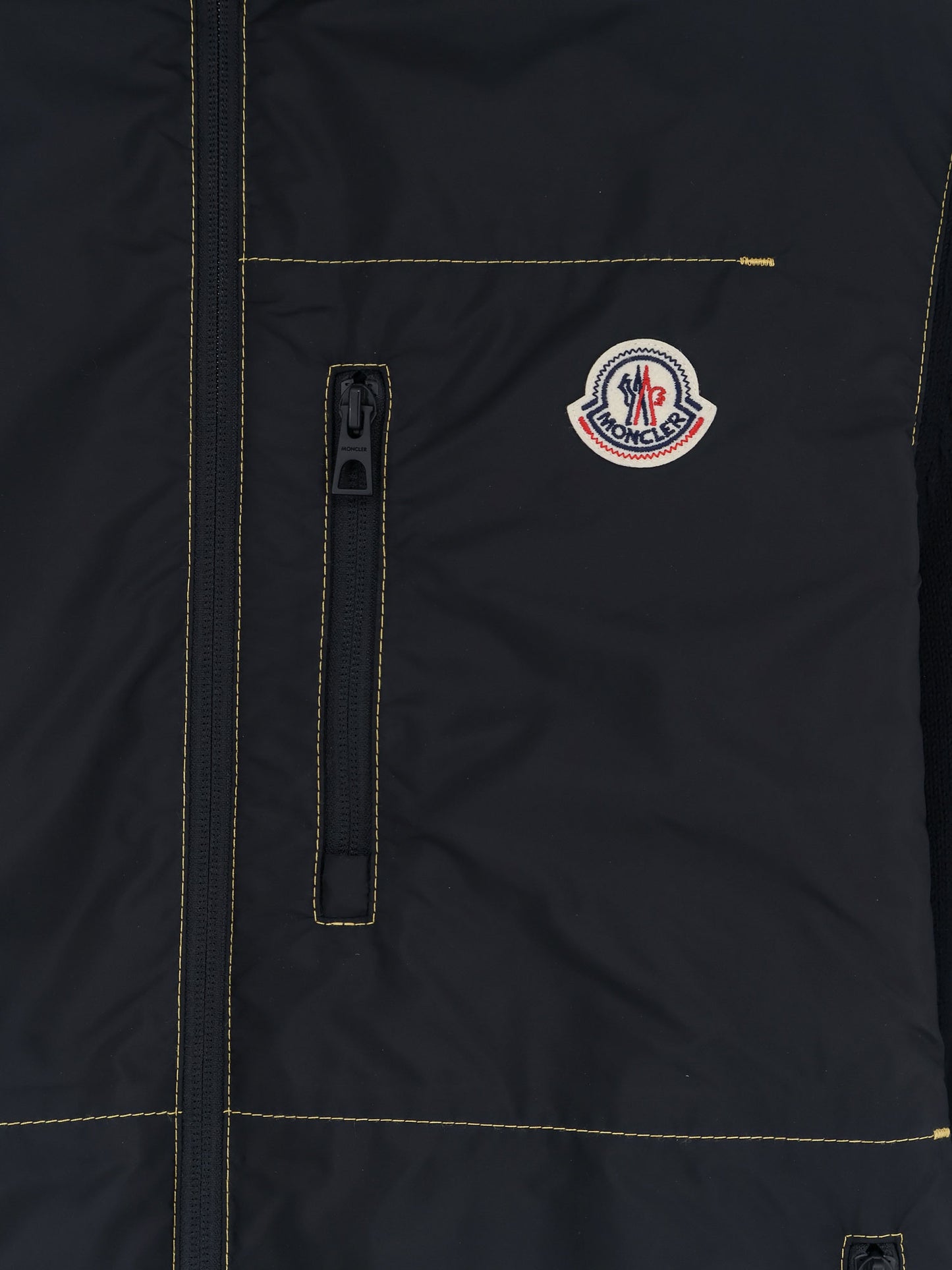 Nylon jacket with cotton inserts