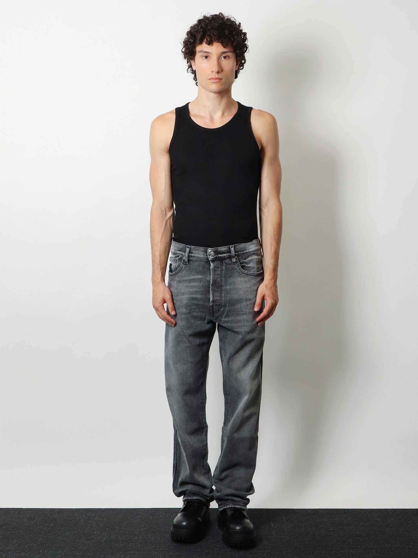 Denim trousers with back logo patch