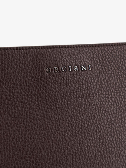 Hammered leather clutch with logo on the front thumbnail