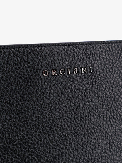 Hammered leather clutch with logo on the front thumbnail