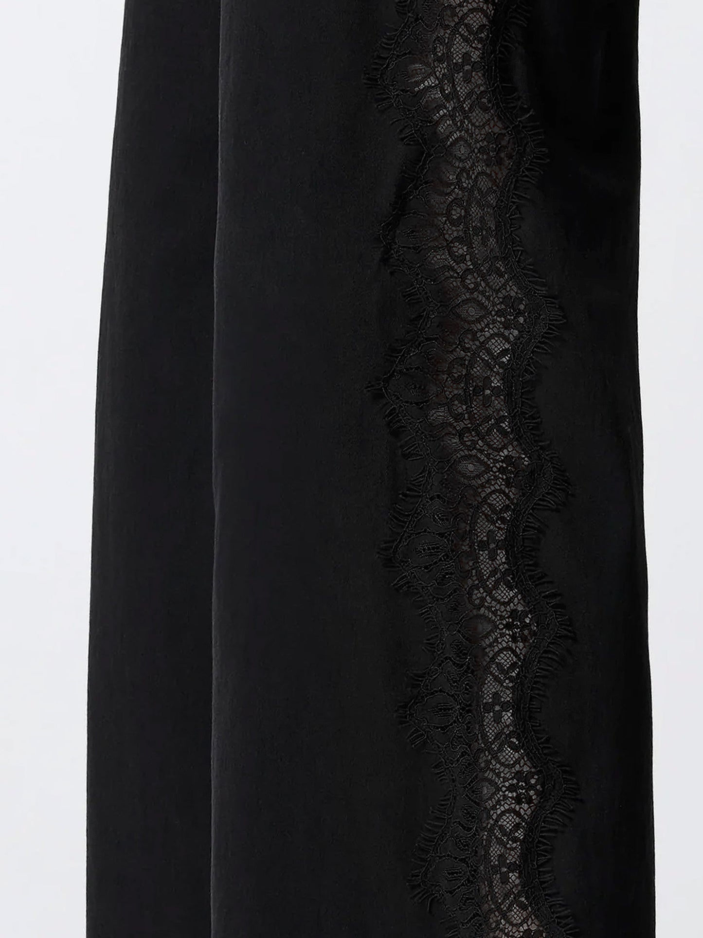 Denim trousers with lace detail on the side