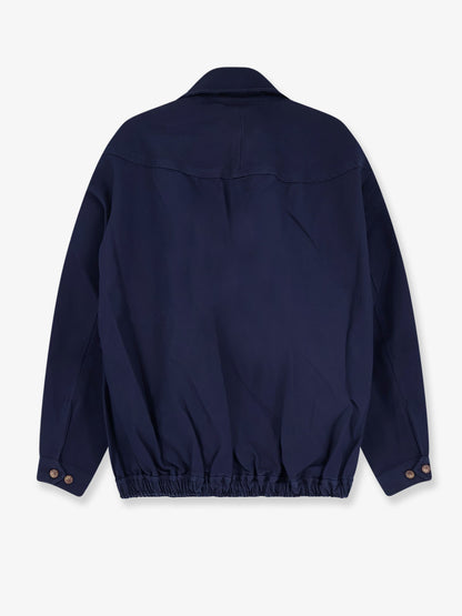 Blue denim jacket with embroidered logo on the front thumbnail