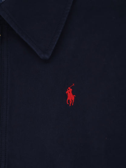 Blue denim jacket with embroidered logo on the front thumbnail