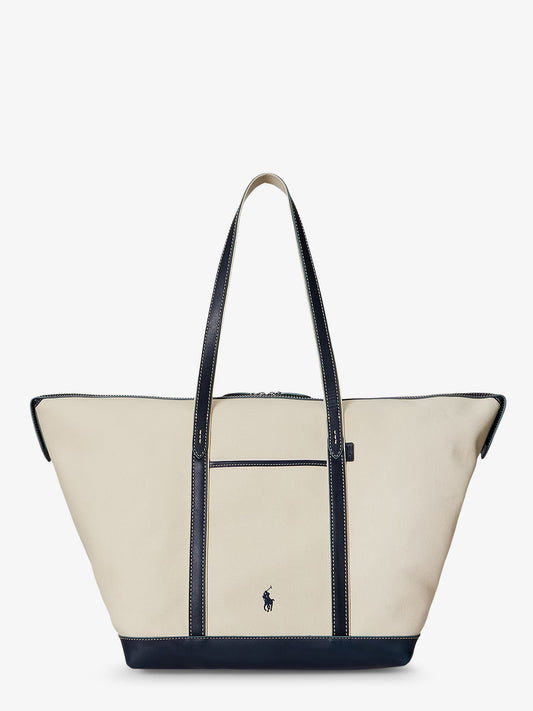 Canvas travel bag with leather profiles