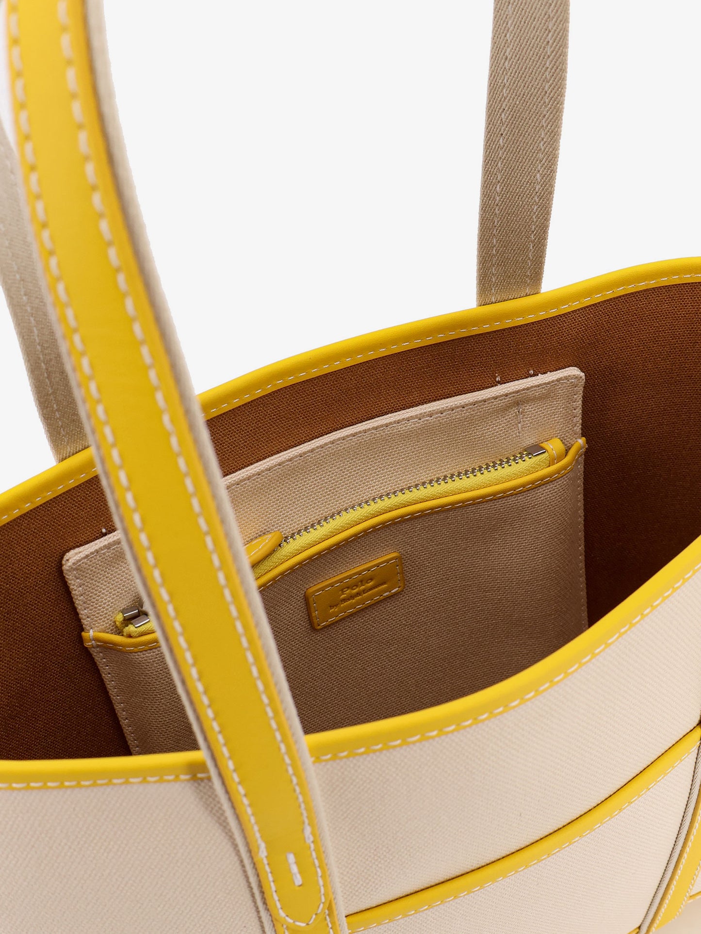 Canvas shoulder bag with embroidered logo on the front