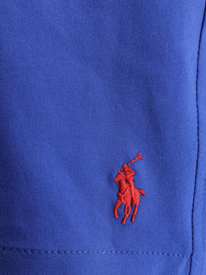 Recycled nylon swim trunks with embroidered logo on the front thumbnail