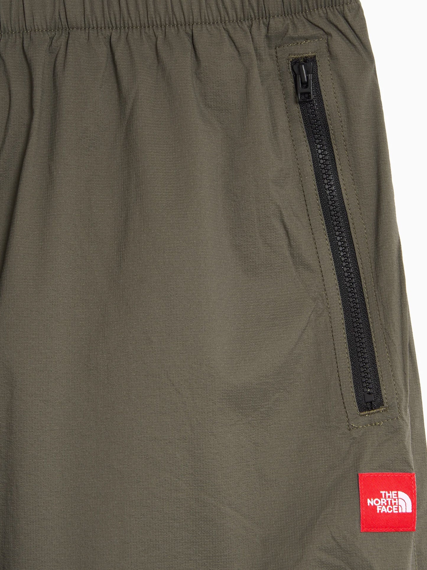 Nylon trousers with patch logo on the side