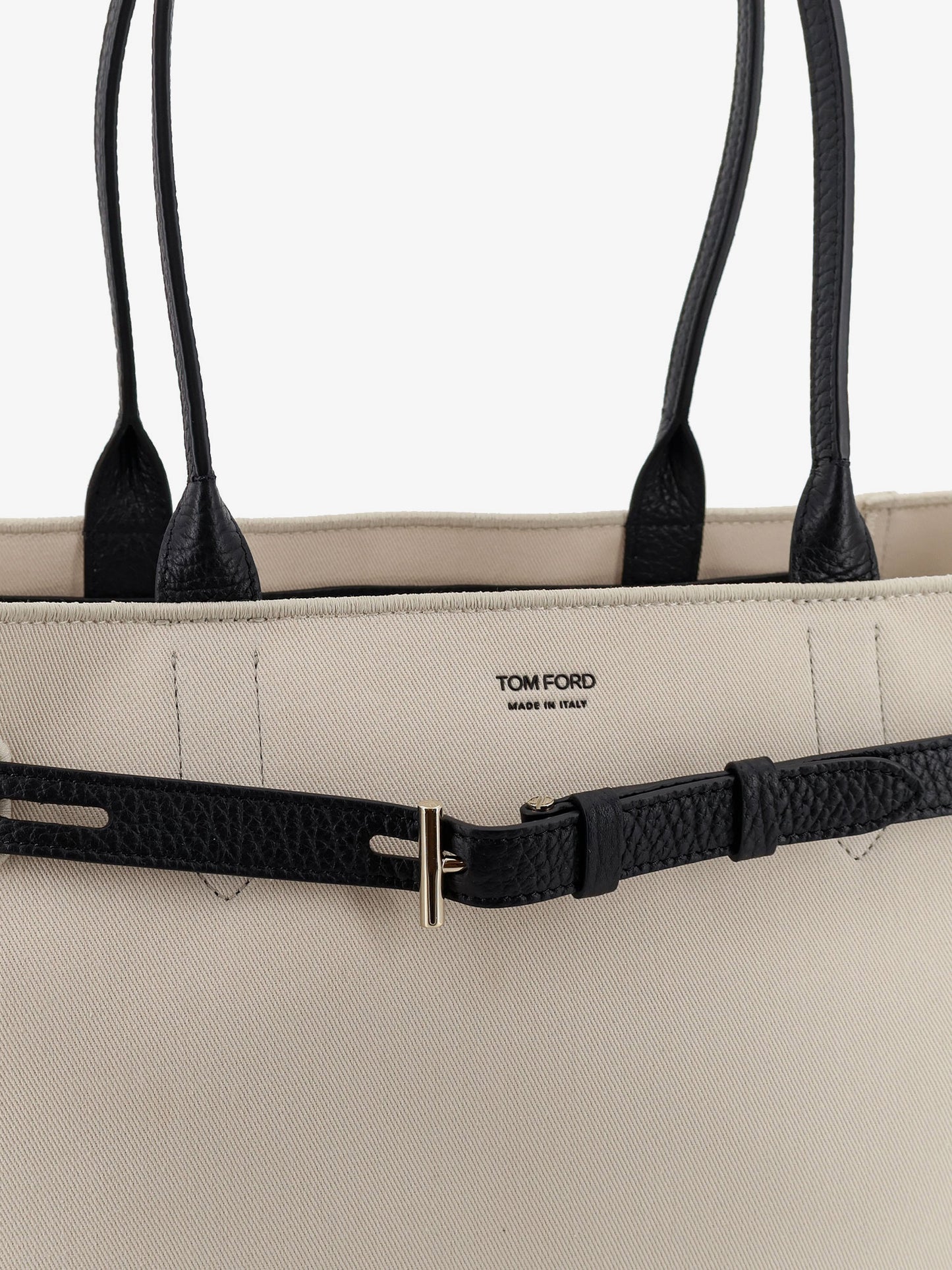 Canvas shoulder bag with engraved logo on the front