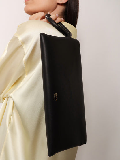 Aura leather clutch bag with lettering logo on the front thumbnail