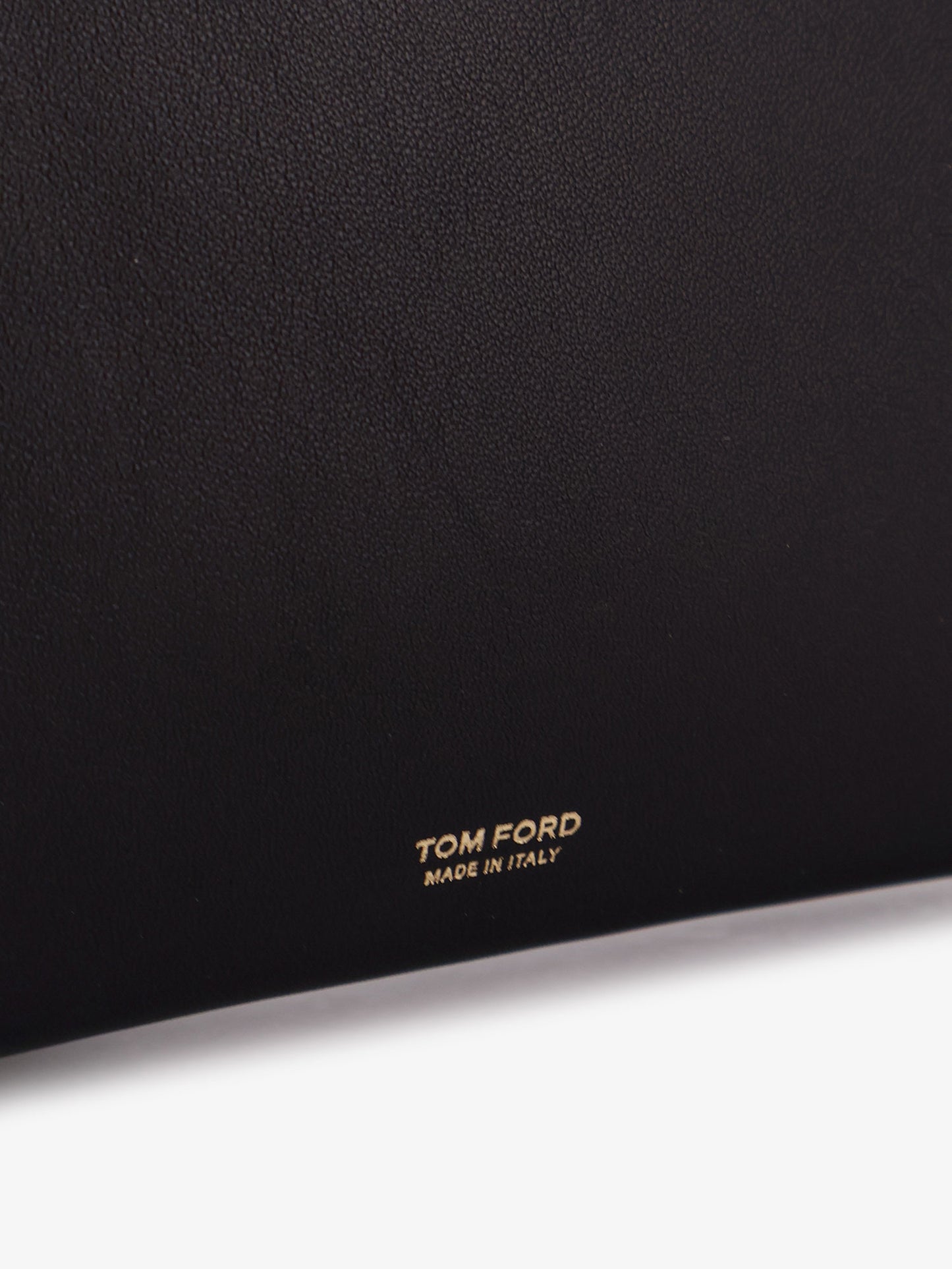 Aura leather clutch bag with lettering logo on the front