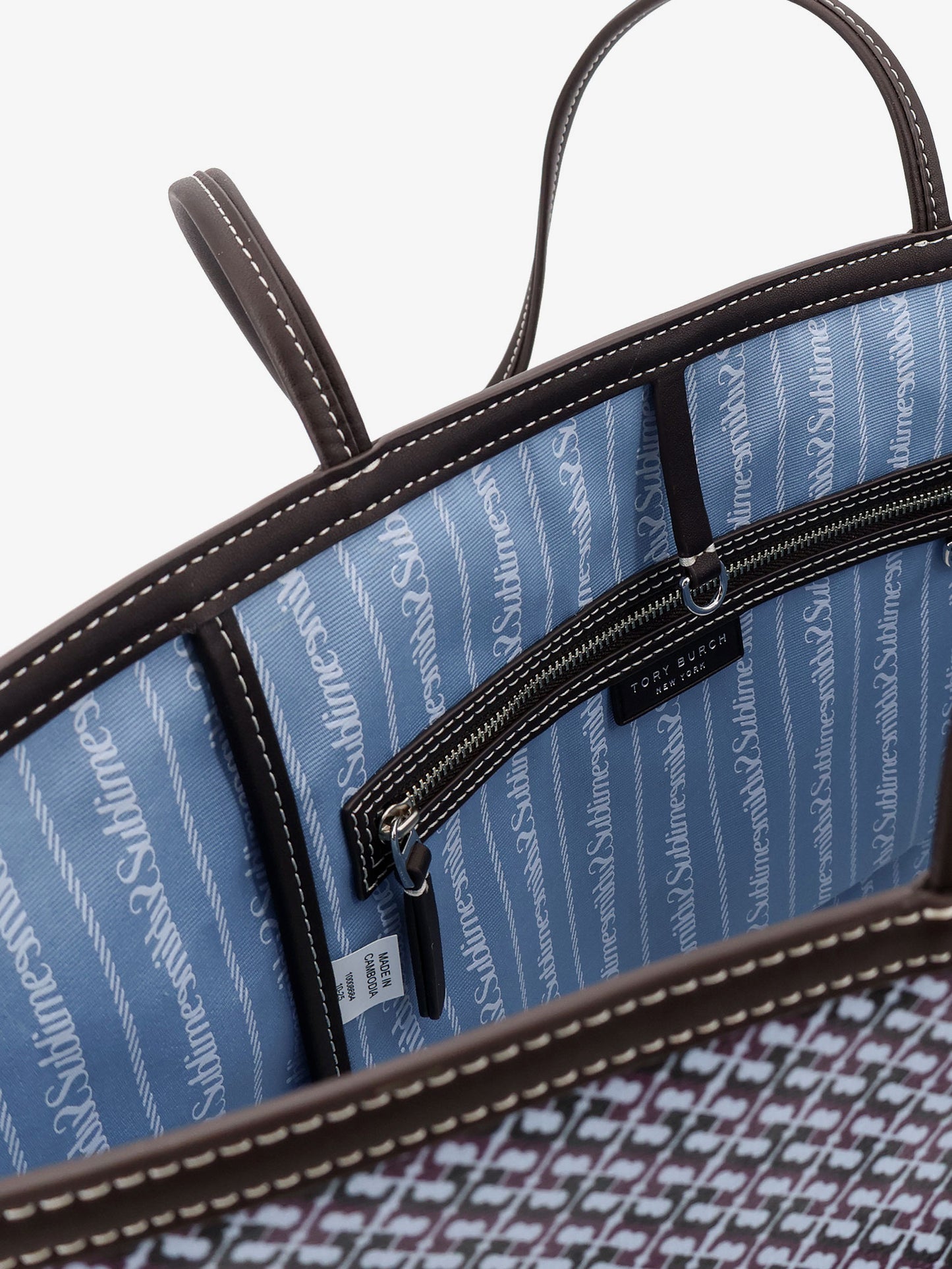 The Racer Tote shoulder bag in coated canvas with all-over logo