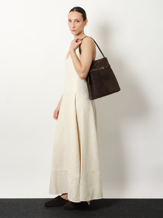 Belted suede bucket bag