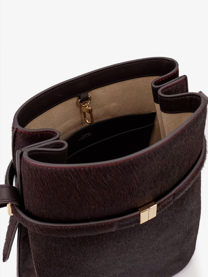 Pony skin shoulder bag with strap on the front thumbnail