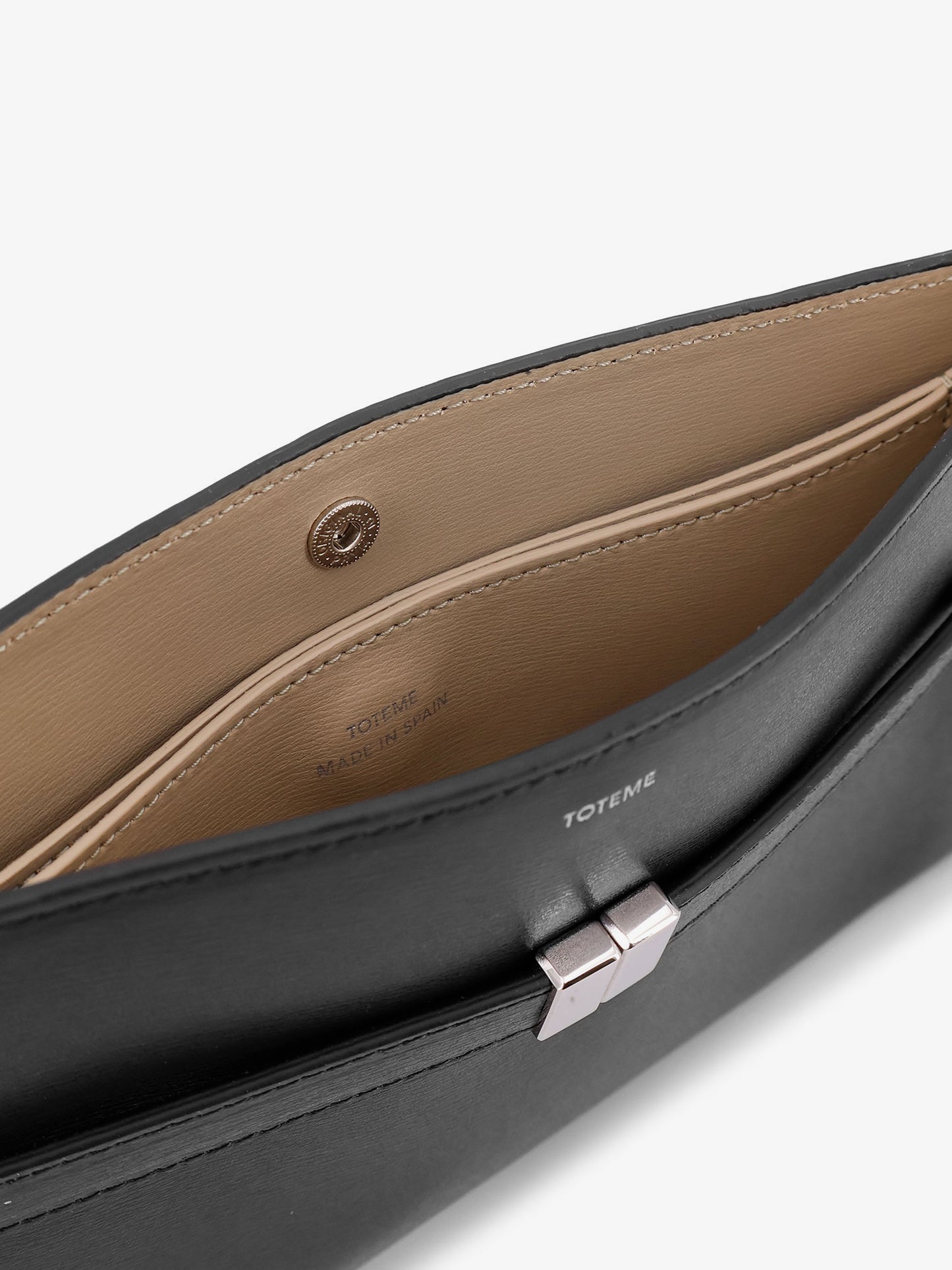 Belted leather crossbody bag