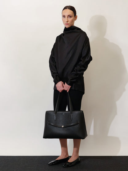 Leather shoulder bag with lettering logo on the front thumbnail