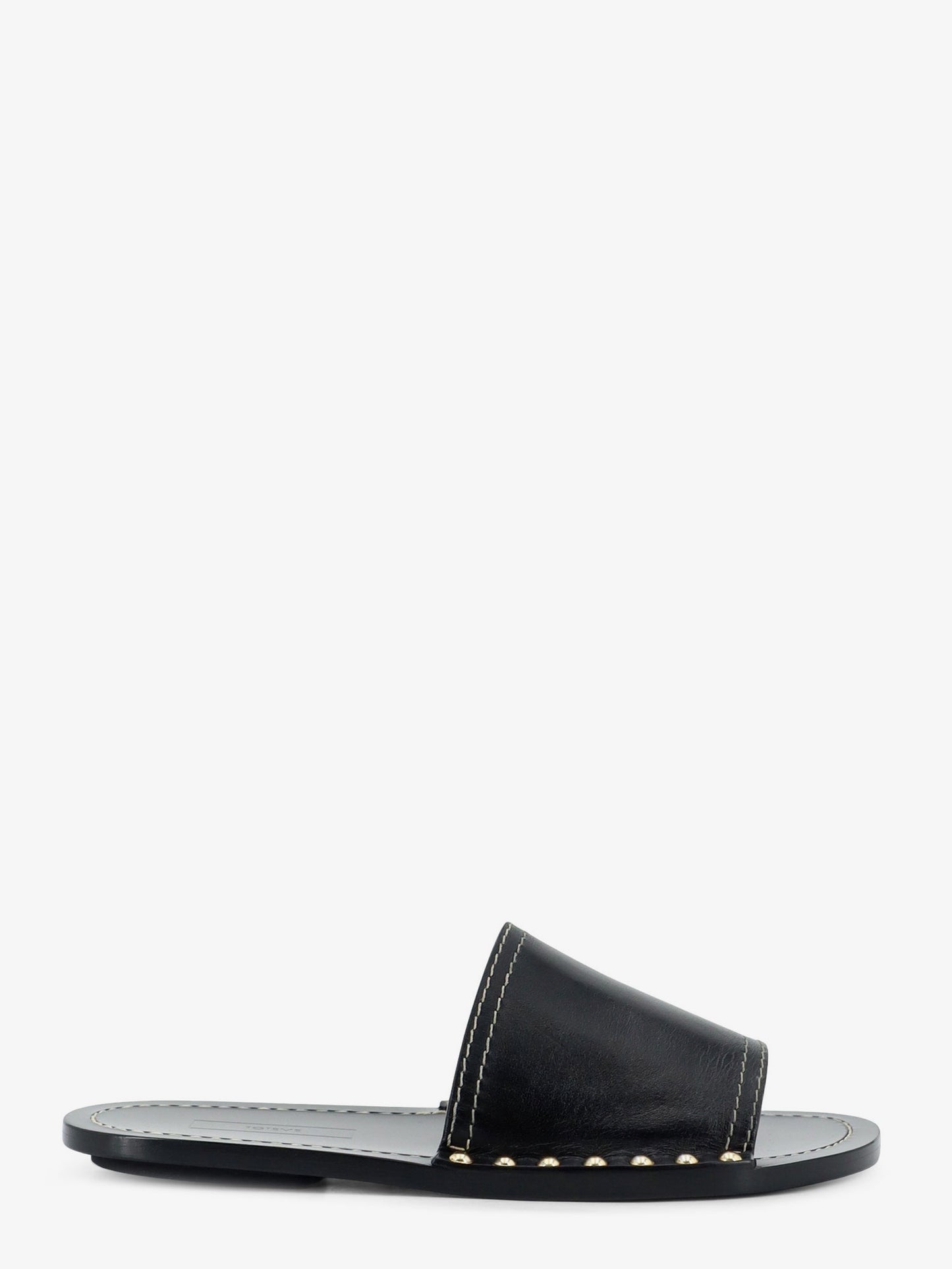 Low leather sandals with metal studs on the sides