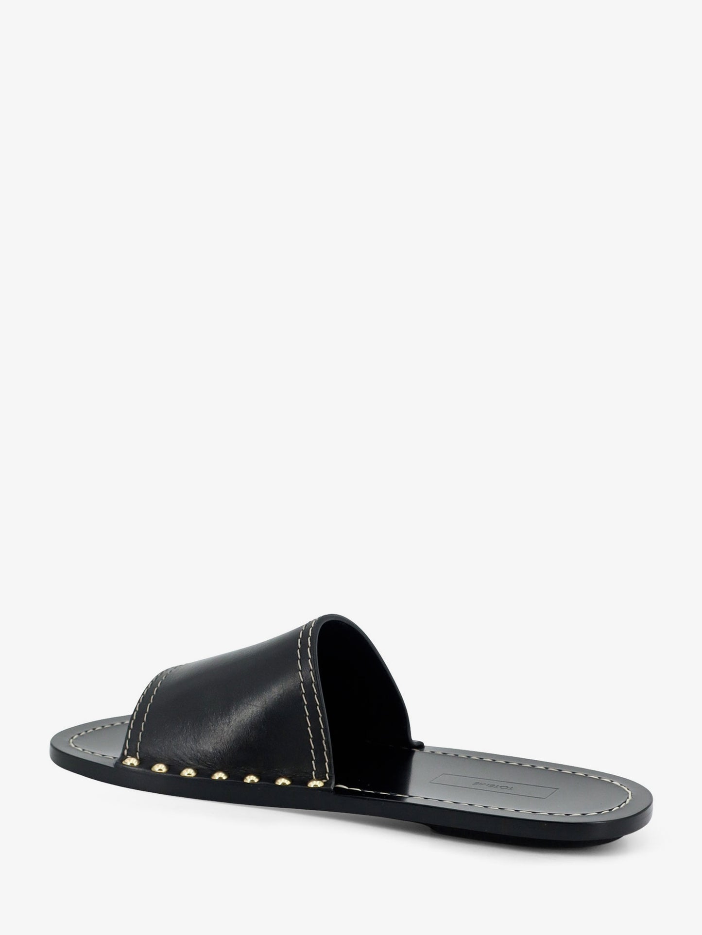 Low leather sandals with metal studs on the sides