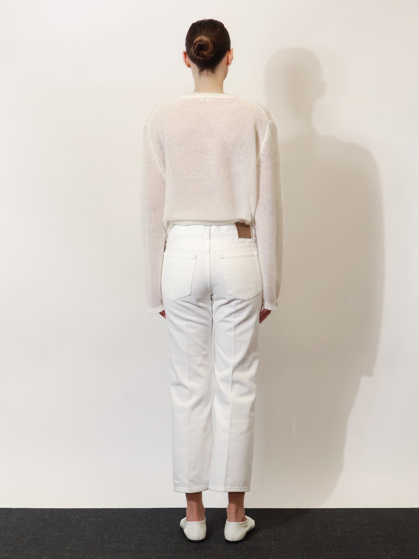 White denim trousers with flared bottom