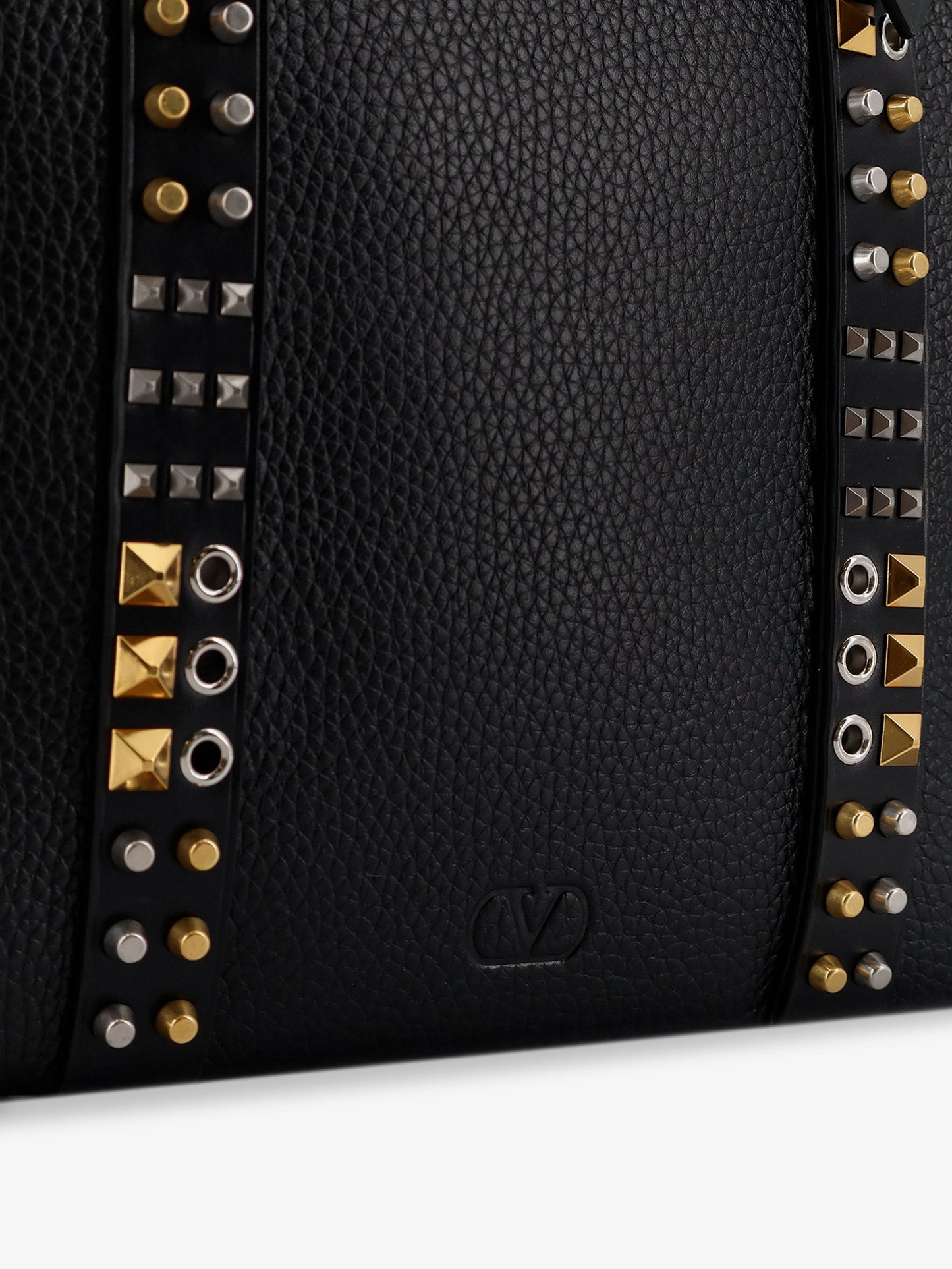 Leather shoulder bag with iconic studs