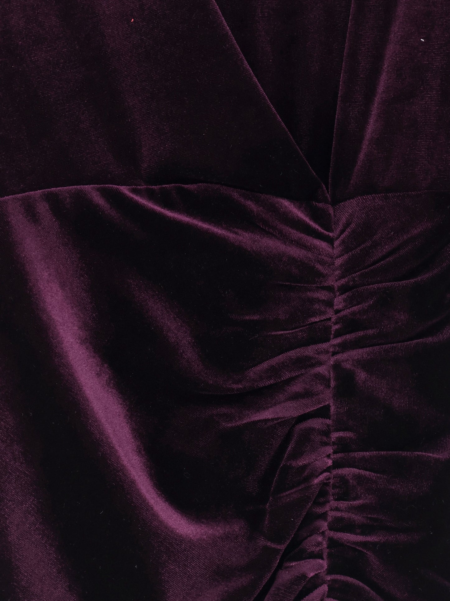 Velvet dress with drapery