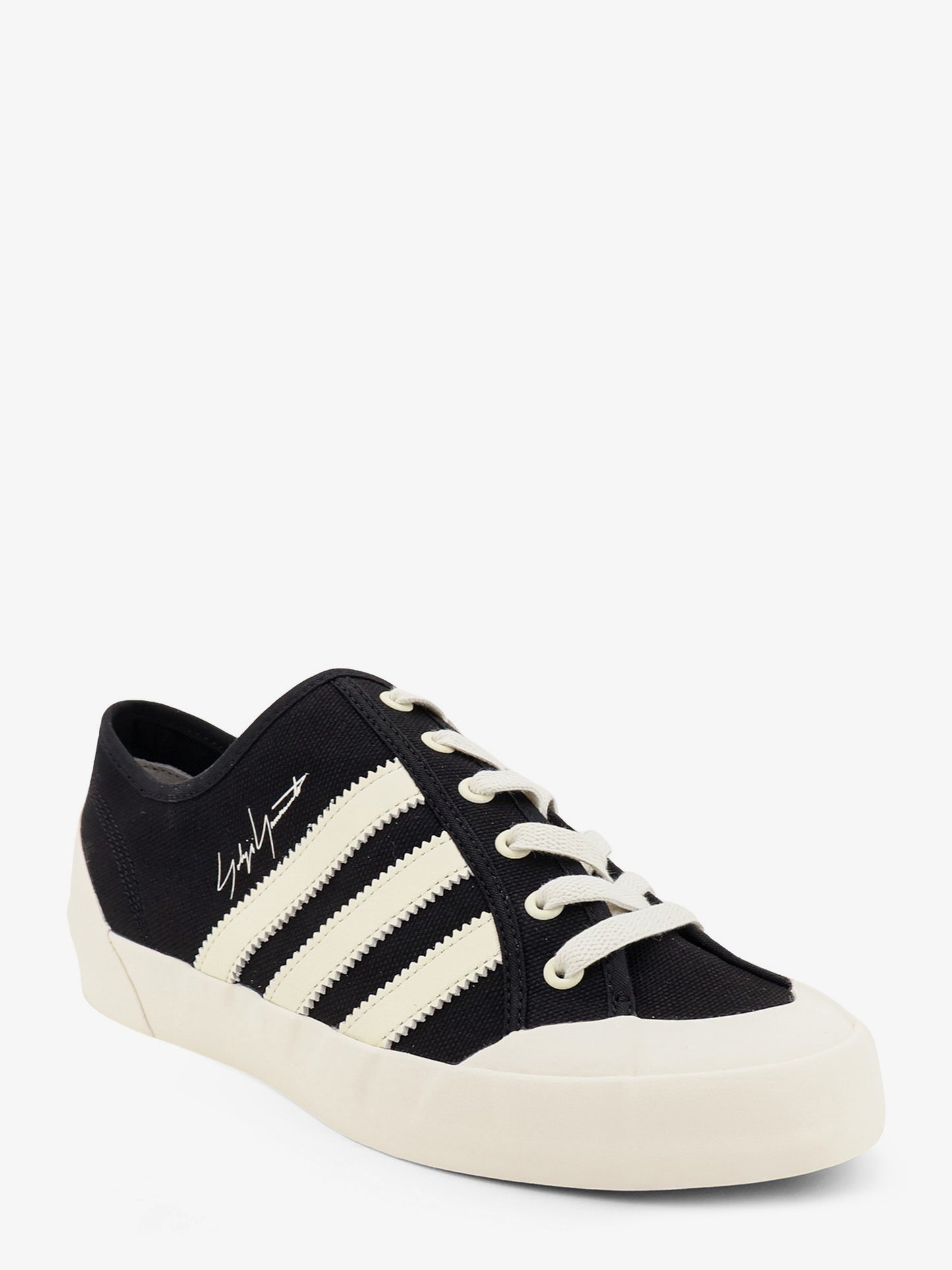 Canvas sneakers with iconic side stripes