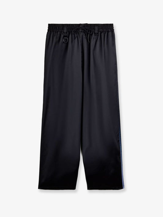 Technical fabric trousers with iconic side stripes