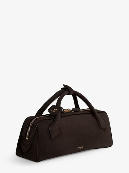 Teckel Clutch suede handbag thumbnail