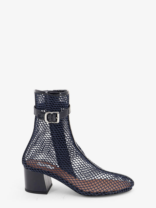 Fishnet 55 mesh and patent leather boots