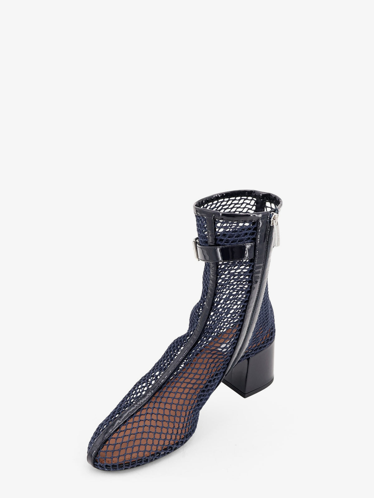 Fishnet 55 mesh and patent leather boots