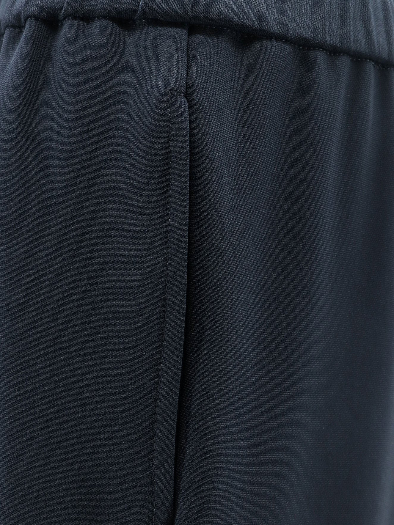 Trousers with elastic