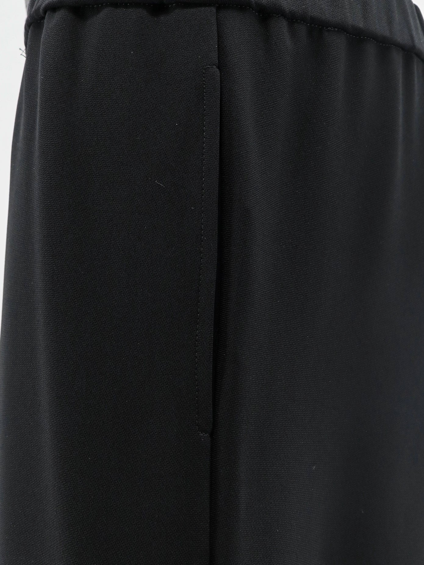 Trousers with elastic