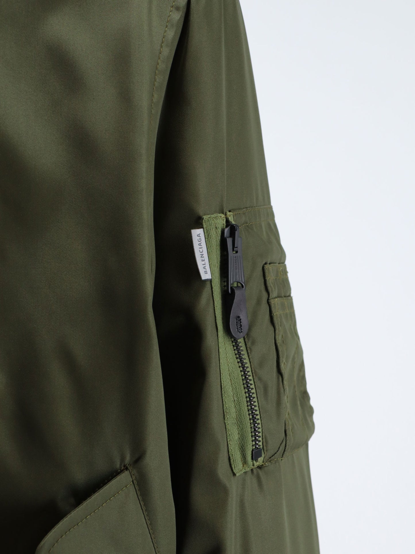 Nylon bomber with orange lining