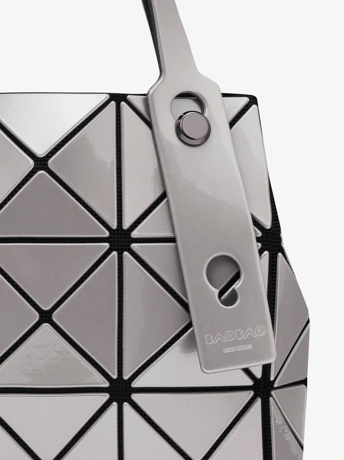 Carat handbag with geometric inserts