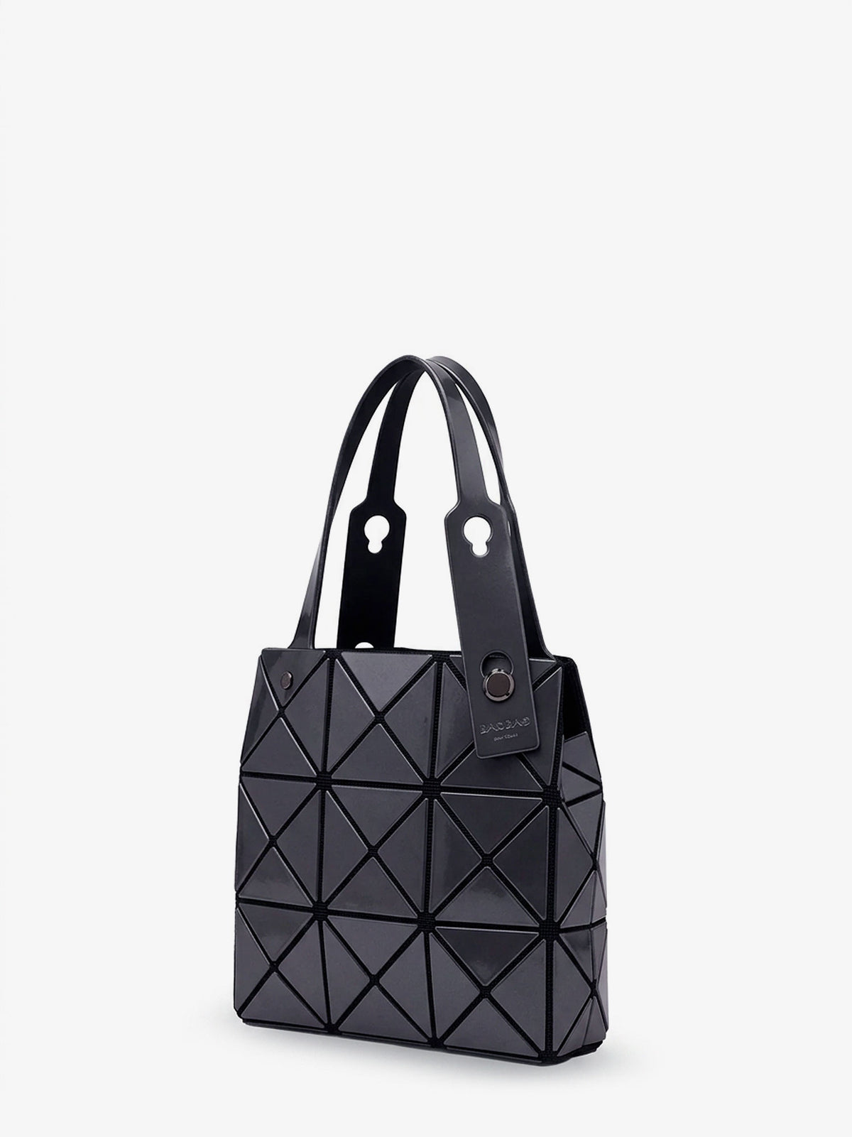 Carat handbag with geometric inserts