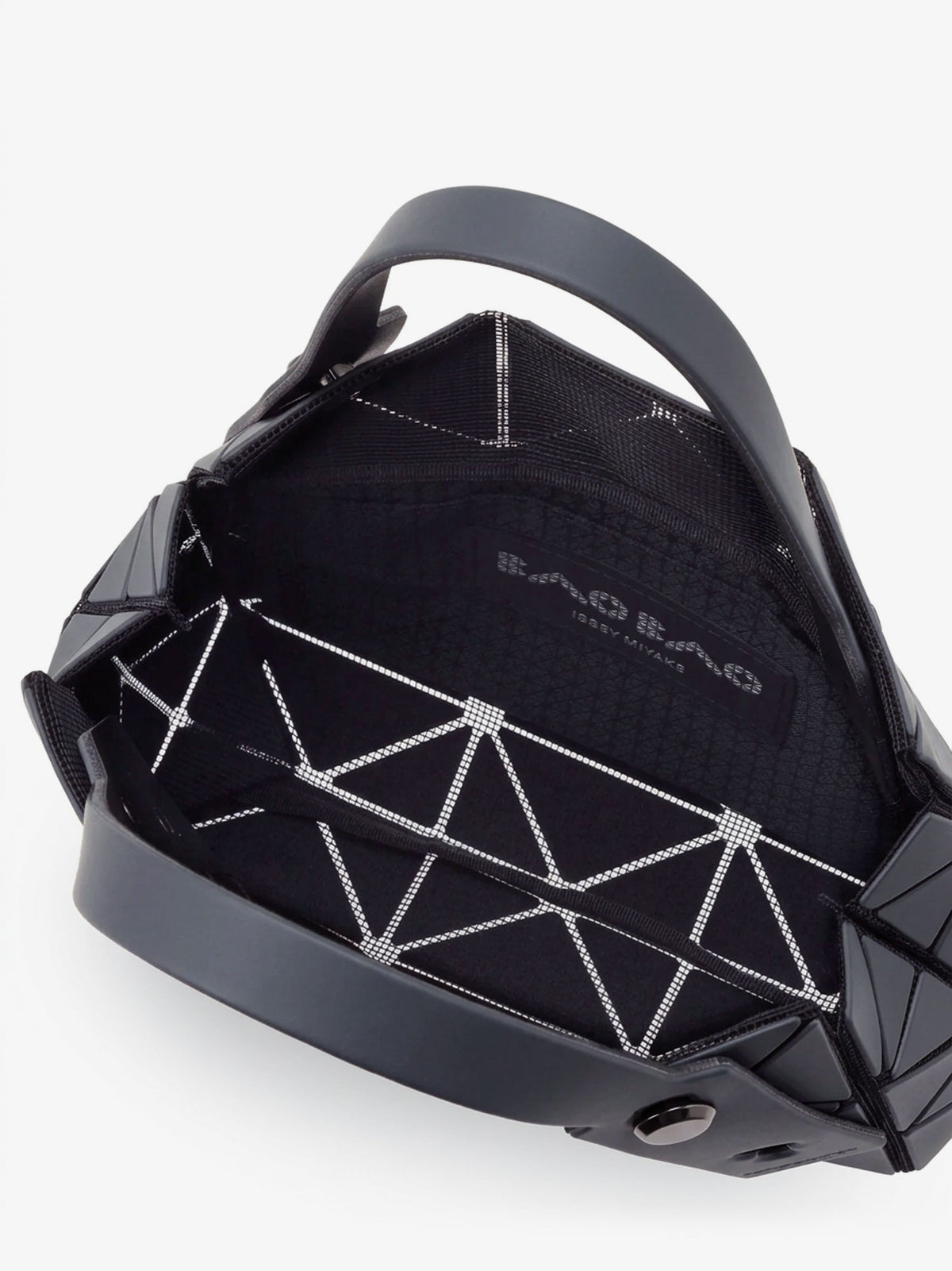 Carat handbag with geometric inserts