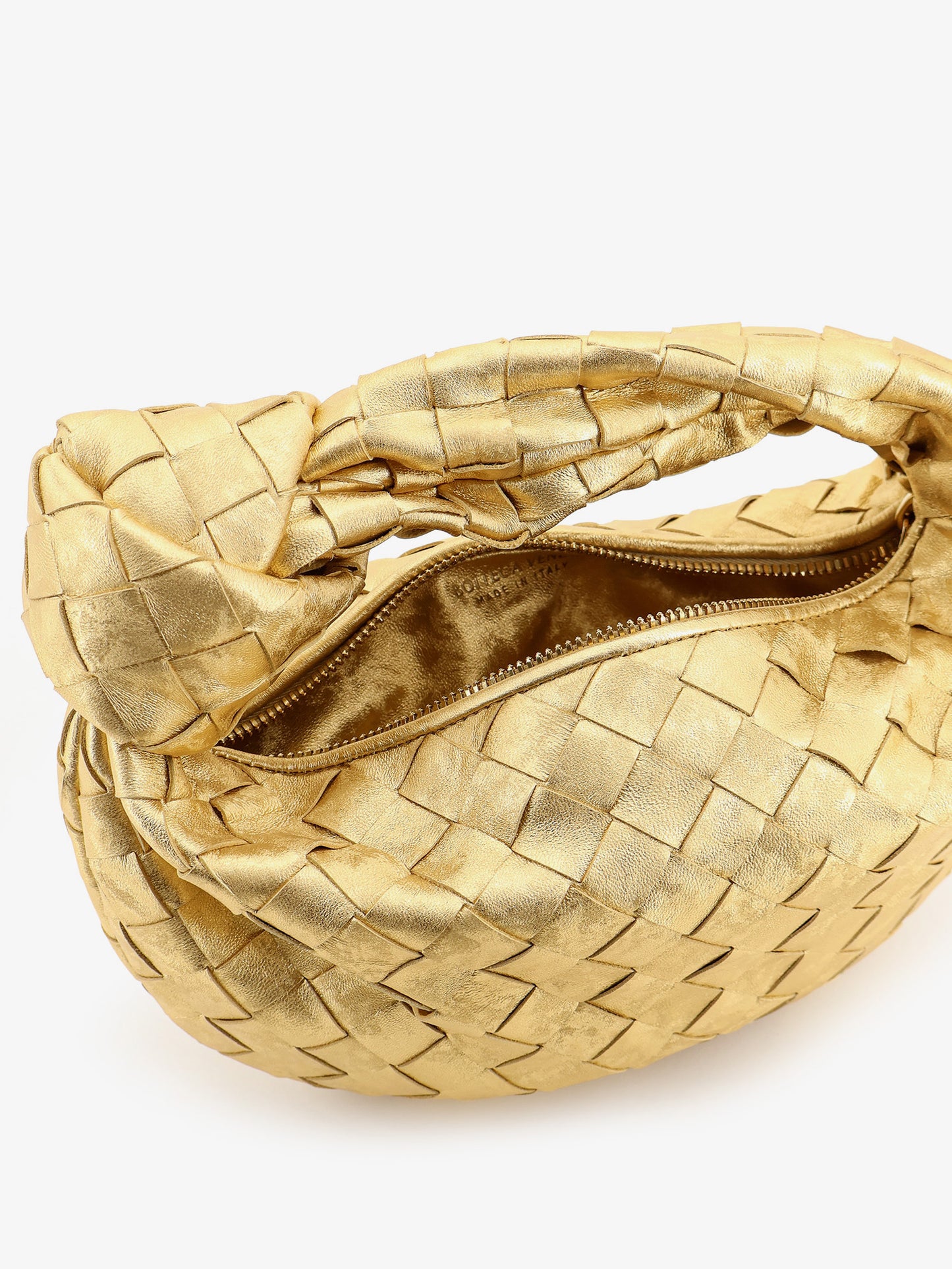 Mini Jodie leather handbag with a foggy mirror effect braided motif