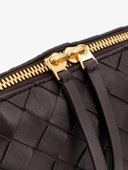 Leather clutch with Intrecciato Concert motif thumbnail