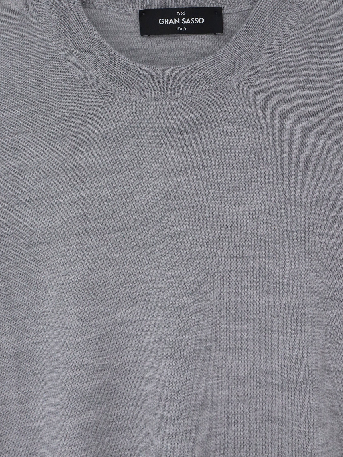 Virgin wool, cashmere, and silk blend sweater