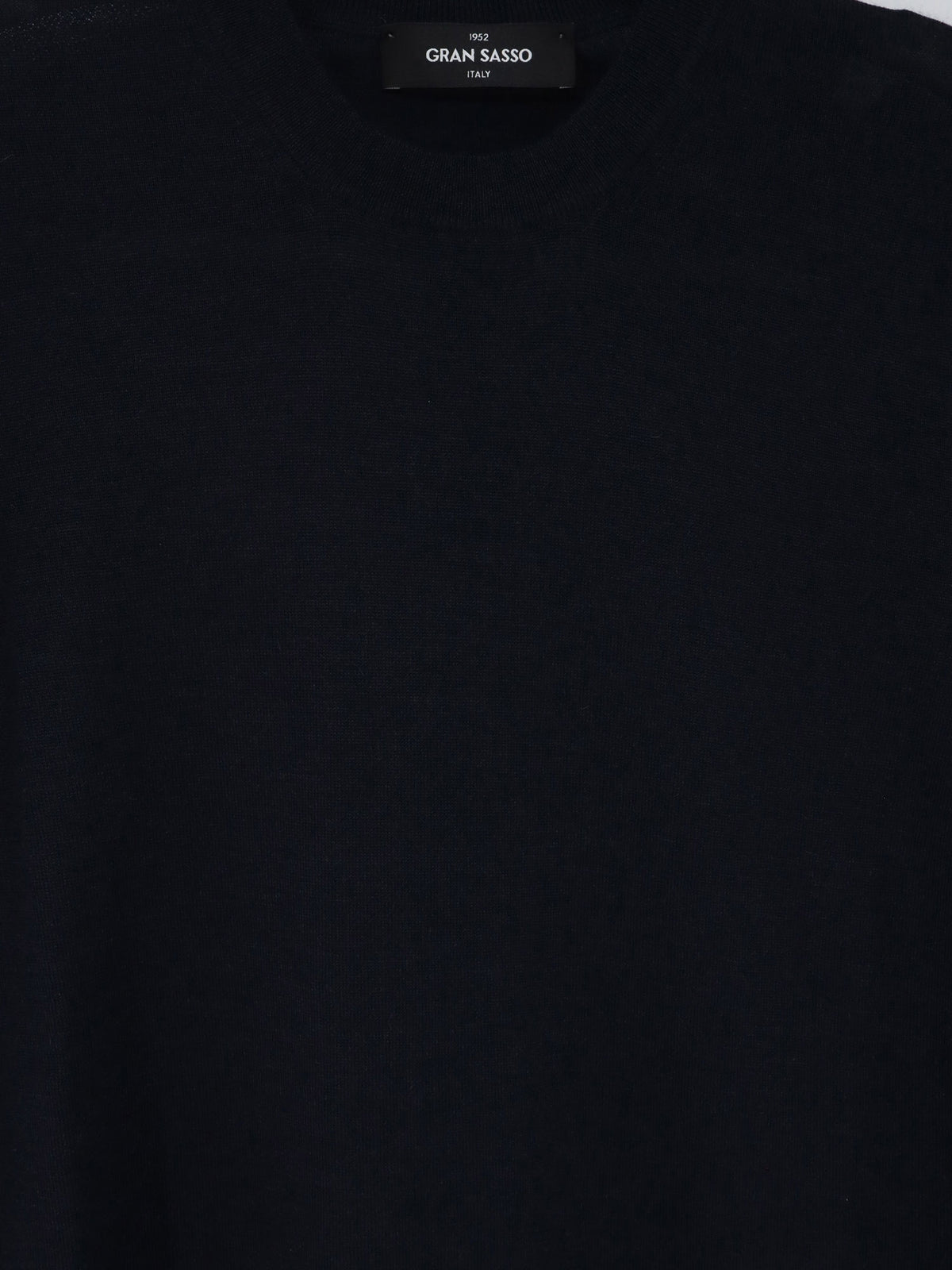 Virgin wool, cashmere, and silk blend sweater