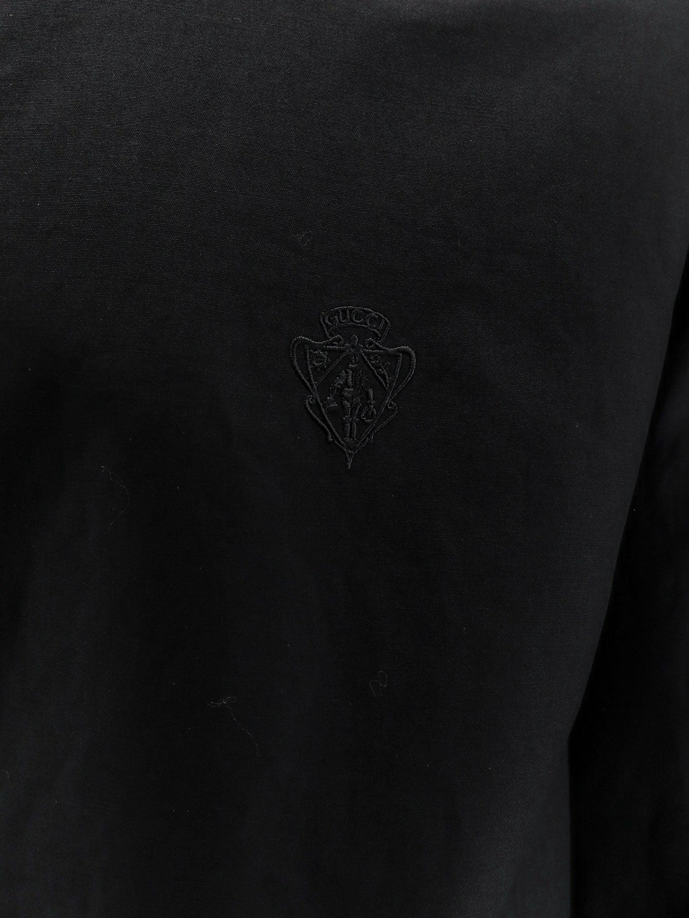 Reversible cotton and GG nylon jacket